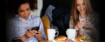 Image result for teens on their phones at lunch